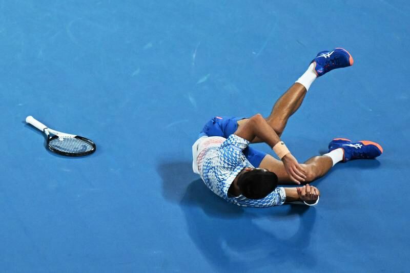 Novak Djokovic takes a tumble. EPA