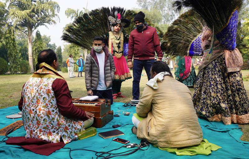 Abhinav Agrawal with artists during a microphone set up.