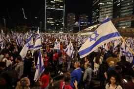 Protesters gather after Israeli Prime Minister Benjamin Netanyahu dismissed his defence minister, Yoav Gallant, who spoke out against judicial reforms. Reuters
