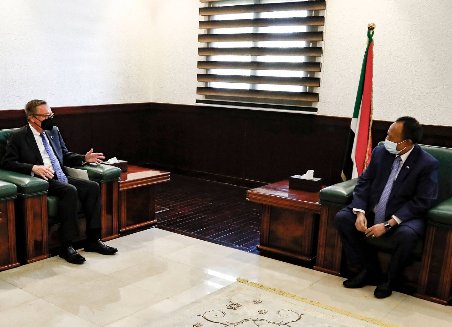 Sudan's Prime Minister Abdalla Hamdok (R) meets with the US Special Envoy for the Horn of Africa Jeffrey Feltman in the capital Khartoum on September 29, 2021. AFP
