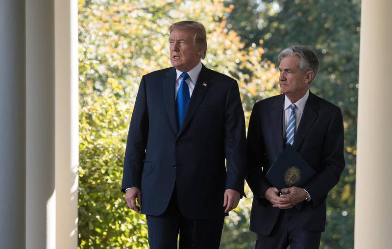 (FILES) In this file photo taken on November 2, 2017 US President Donald Trump walks with Jerome Powell, Federal Reserve chairman, at the White House in Washington, DC. The Federal Reserve is set to "vaccinate" the US economy against a slowdown with the first interest rate cut in a decade, but the decision has been made more difficult by unrelenting political pressure. President Donald Trump has constantly berated the Fed and its chairman, Jerome Powell, for failing to provide additional juice to the economy, which he has promised will grow by three percent and more each year."The EU and China will further lower interest rates and pump money into their systems, making it much easier for their manufacturers to sell product," Trump tweeted on July 29, 2019.
 / AFP / NICHOLAS KAMM
