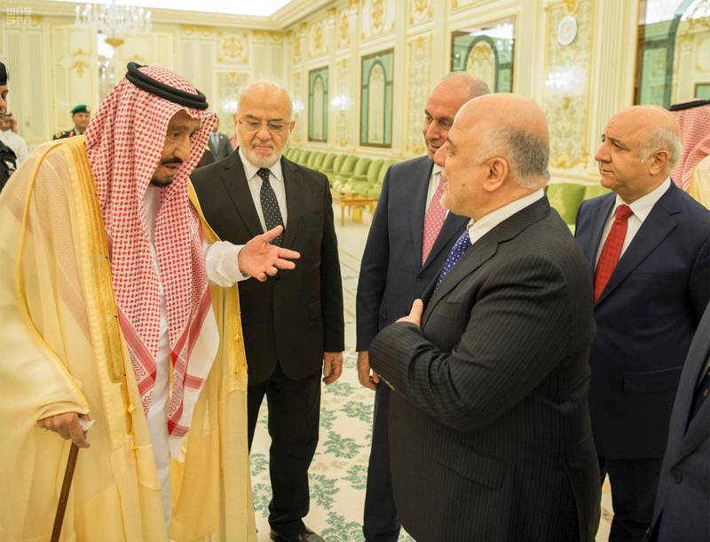 Saudi Arabia's King Salman bin Abdulaziz Al Saud gestures as he speaks with Iraqi Prime Minister Haider al-Abadi in Riyadh, Saudi Arabia October 22, 2017. Saudi Press Agency/Handout via REUTERS ATTENTION EDITORS - THIS PICTURE WAS PROVIDED BY A THIRD PARTY. NO RESALES. NO ARCHIVE.