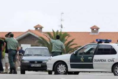 Spanish police cordon off the site where a bomb exploded in a golf club in Noja, northern Spain, in July. Four bombs exploded in Cantabria, northern Spain on Sunday, after warning calls from the Basque separatist group ETA.