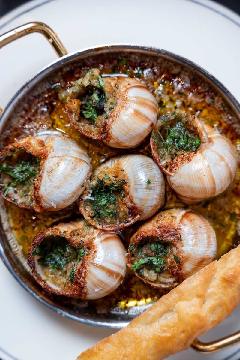 Wait patiently at your peril, these delicious escargot won't be on the plate for long. 