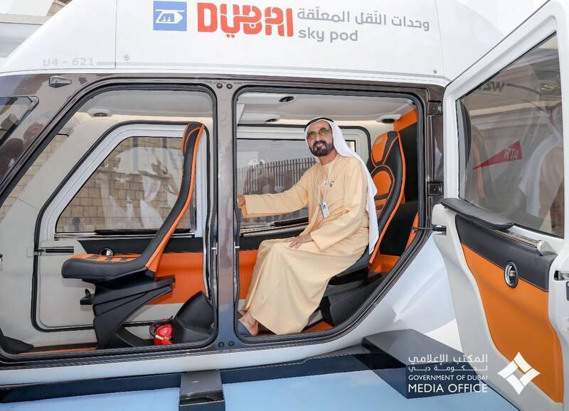 Sheikh Mohammed reviews a Sky Pod model being tested by Dubai's Roads and Transport Authority, in February 2019.