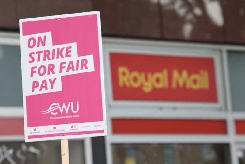 A picket line at the Royal Mail Whitechapel Delivery Office in east London. The ONS says pay is the most common form of dispute between workers and employers. PA