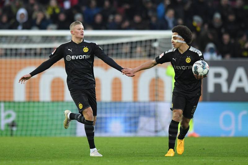 Erling Haaland celebrates with teammate Axel Witsel after scoring Borussia Dortmund's second goal. Getty Images