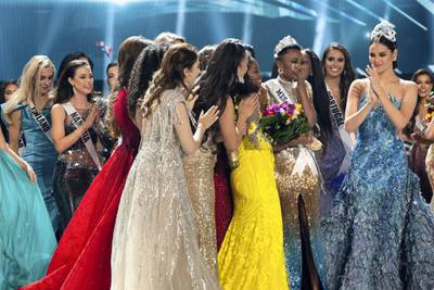 Zozibini Tunzi, Miss South Africa 2019 is congratulated by fellow contestants after being crowned Miss Universe at the conclusion of The MISS UNIVERSE® Competition on FOX at 7:00 PM ET on Sunday, December 8, 2019 live from Tyler Perry Studios in Atlanta. The new winner will move to New York City where she will live during her reign and become a spokesperson for various causes alongside The Miss Universe Organization. HO/The Miss Universe Organization