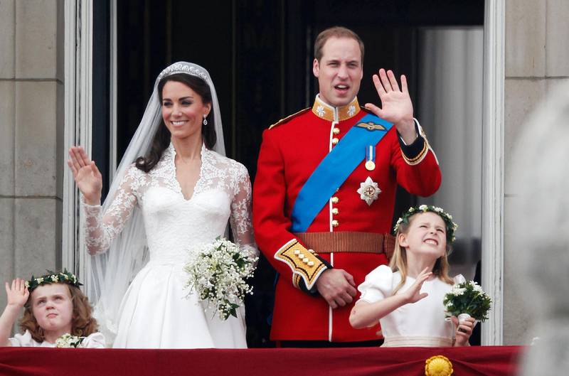 LONDON, ENGLAND - APRIL 29:  TRH Catherine, Duchess of Cambridge and Prince William, Duke of Cambridge greet well-wishers from the balcony at Buckingham Palace on April 29, 2011 in London, England. The marriage of the second in line to the British throne was led by the Archbishop of Canterbury and was attended by 1900 guests, including foreign Royal family members and heads of state. Thousands of well-wishers from around the world have also flocked to London to witness the spectacle and pageantry of the Royal Wedding.  (Photo by Christopher Furlong/Getty Images)