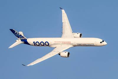 An Airbus A350-1000 aircraft flies during the 2023 Dubai Airshow at Dubai World Central. AFP