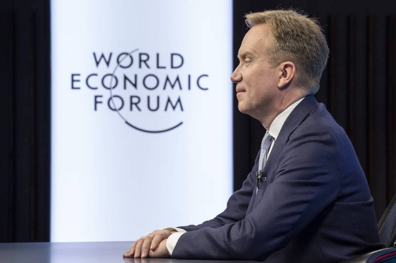 Borge Brende, President of the World Economic Forum (WEF), listens to Indian Prime Minister Narendra Modi and Klaus Schwab, Founder and Executive Chairman of the World Economic Forum (WEF), displayed in screens during the Davos Agenda 2022, in Cologny near Geneva, Switzerland, Monday, Jan.  17, 2022.  The Davos Agenda, which takes place from  Jan.  17 to Jan.  21, 2022, is an online edition of the annual Davos meeting of the World Economy Forum due to the coronavirus pandemic.  (Salvatore di Nolfi / Keystone via AP)
