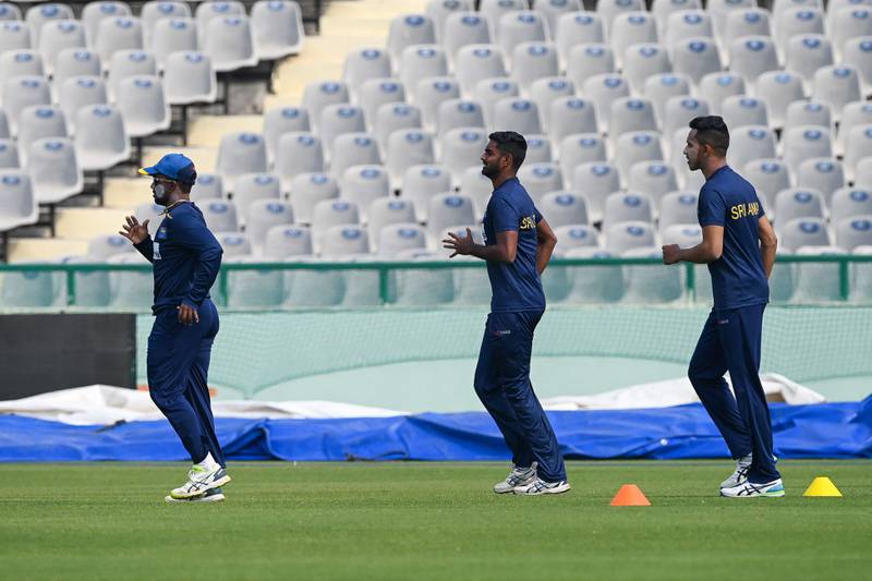 Sri Lanka players warm up in Mohali. AFP