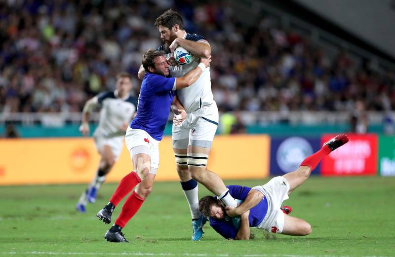 Thretton Palamo (C) of the United States is tackled by Camille Lopez (L) and Sebastien Vahaamahina (R) of France during the Rugby World Cup 2019 Group C game between France and USA at Fukuoka Hakatanomori Stadium in Fukuoka, Japan. Getty Images