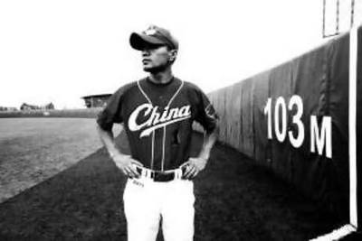 BEIJING, JULY -18: Sun Linfeng, member of the national baseball team, poses in the field .