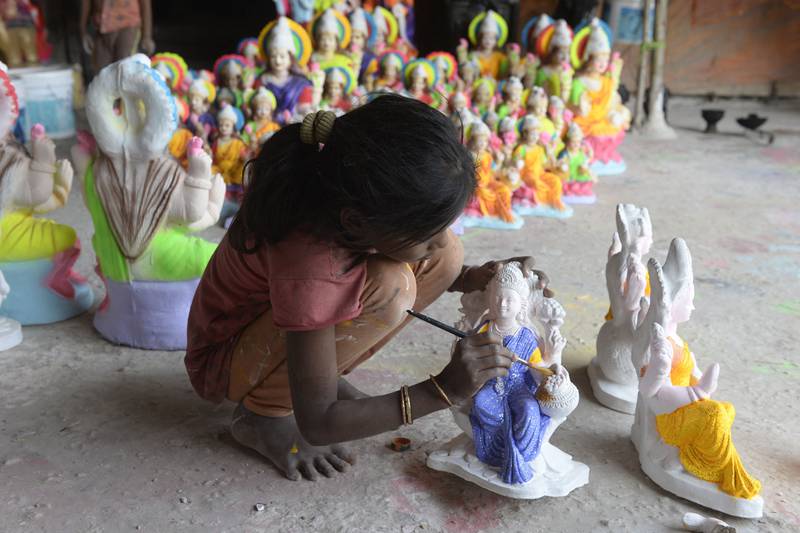A young artisan at work in Hyderabad. AFP