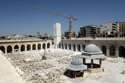 Blocks of ashlar sit in the Grand Umayyad Mosque's courtyard in Aleppo as renovation work gets under way. All photos: AFP