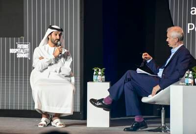 Abdulla bin Touq, the UAE's Minister of Economy, talks to Stephen Sackur, presenter at HARD Talk, at the Future Hospitality Summit in Abu Dhabi. Khushnum Bhandari / The National