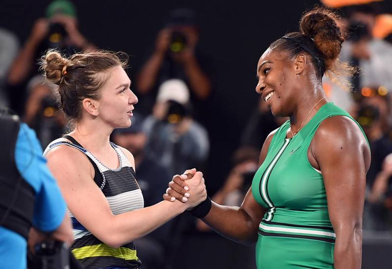United States' Serena Williams, right, is congratulated by Romania's Simona Halep after winning their fourth round match at the Australian Open tennis championships in Melbourne, Australia, Monday, Jan. 21, 2019. (AP Photo/Andy Brownbill)