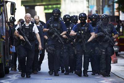 Armed police arrive at The Shard in Britain’s capital  following a terror attack on London Bridge. Niklas Halle’n / AFP Photo