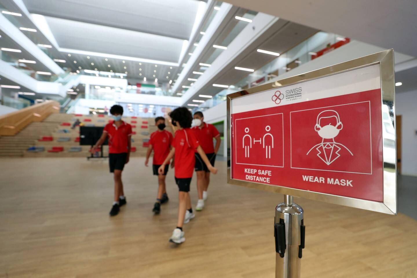 Signs remind pupils to follow Covid-19 precautions at the Swiss International Scientific School in Dubai. Chris Whiteoak / The National