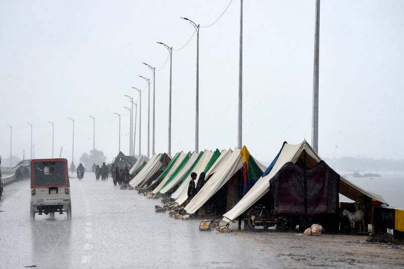 Tents provide temporary shelter for people in Sukkur, Sindh province, who fled their flooded homes. AFP