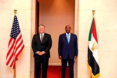 US Secretary of State Mike Pompeo stands with Sudanese Gen. Abdel Fattah Burhan, the head of the ruling sovereign council, in Khartoum, Sudan. AP Photo