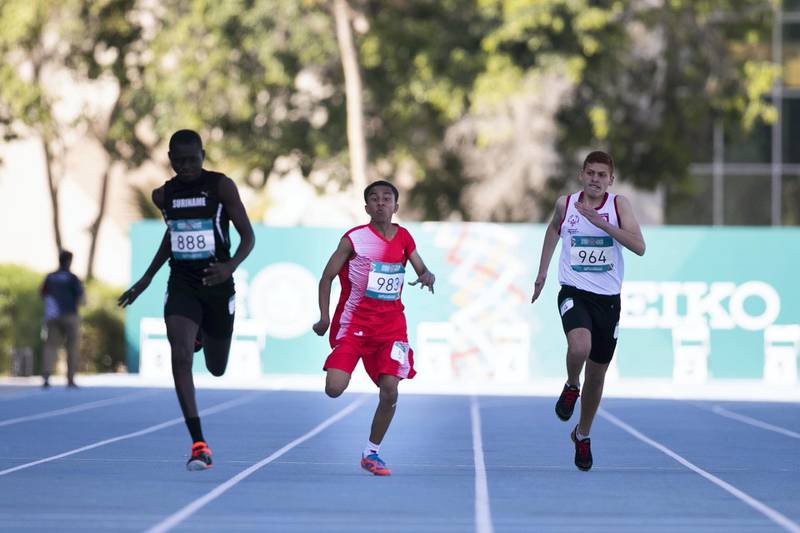 DUBAI, UNITED ARAB EMIRATES - March 19 2019.14 yo Emirati athlete ALI ALMESMARI places 4th at Special Olympics World Games athletics 100M race in Dubai Police Academy Stadium. (Photo by Reem Mohammed/The National)Reporter: Section:  NA