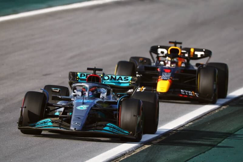 George Russell leads Red Bull's Max Verstappen during the sprint race. Getty