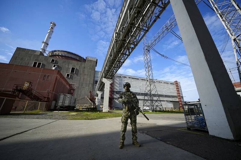 A Russian serviceman guards an area of the Zaporizhzhia nuclear power station. AP