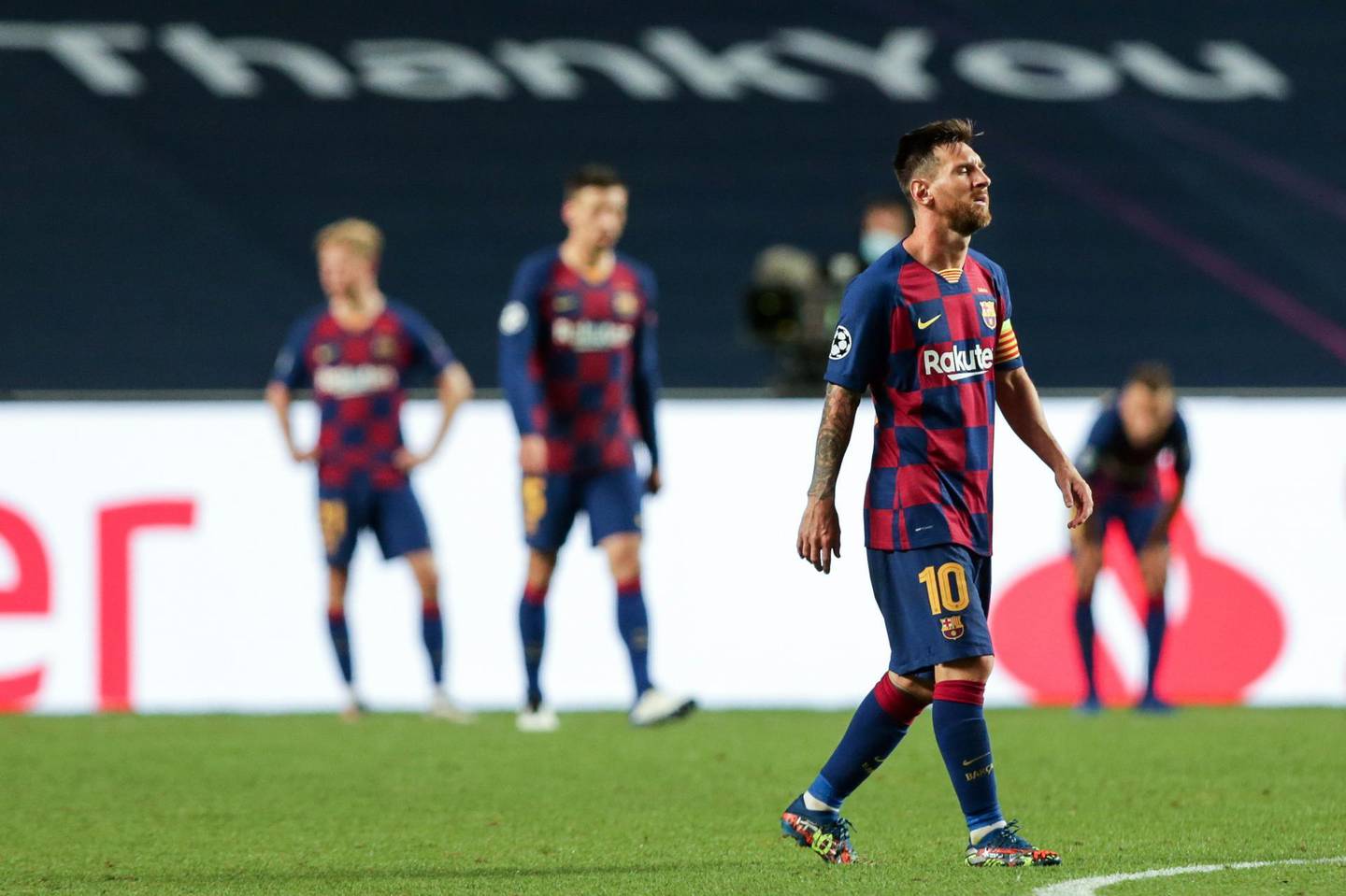epa08604466 FC Barcelona's Lionel Messi shows his dejection at the end of the UEFA Champions League quarter final soccer match FC Barcelona vs Bayern Munich held at Luz Stadium in Lisbon, Portugal, 14 August 2020.  EPA/TIAGO PETINGA