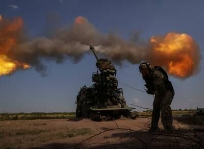 A Bohdana self-propelled howitzer being fired at Russian troops near Bakhmut, Ukraine. Reuters