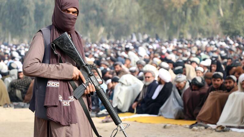 An image that illustrates this article Beyond the Headlines: A look back at the Taliban takeover and Gaza-Israel war in 2021