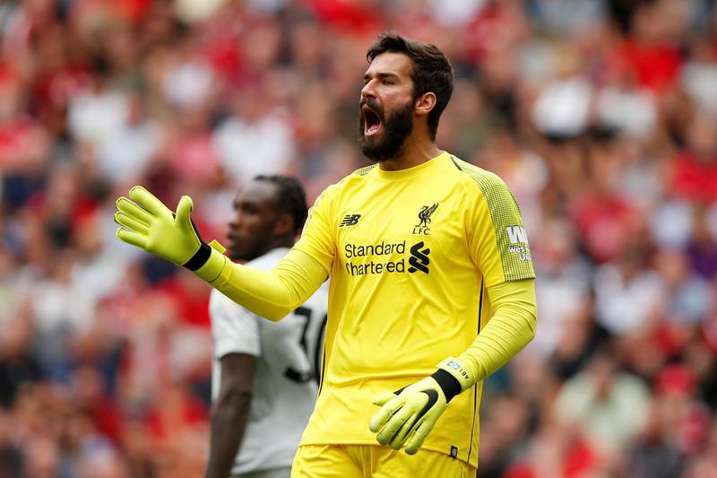 Soccer Football - Premier League - Liverpool v West Ham United - Anfield, Liverpool, Britain - August 12, 2018   Liverpool's Alisson gestures during the match    REUTERS/Andrew Yates    EDITORIAL USE ONLY. No use with unauthorized audio, video, data, fixture lists, club/league logos or "live" services. Online in-match use limited to 75 images, no video emulation. No use in betting, games or single club/league/player publications.  Please contact your account representative for further details.