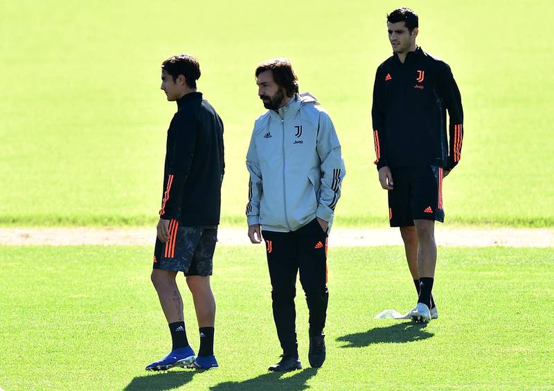 Juventus manager Andrea Pirlo with Paulo Dybala and Alvaro Morata during training. Reuters