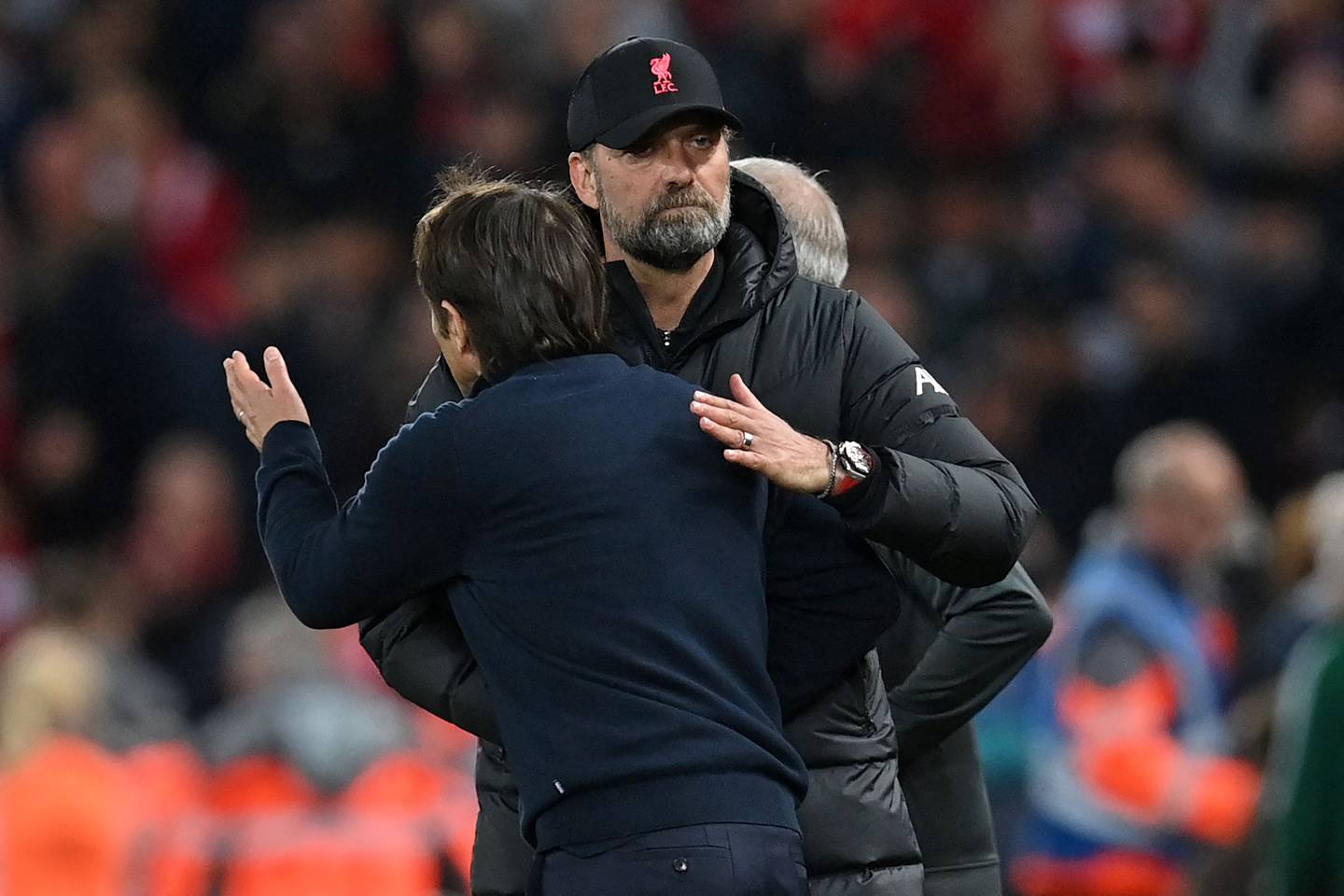 Liverpool manager Jurgen Klopp with Antonio Conte after the match at Anfield. AFP