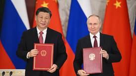 Vladimir Putin hails closer economic and energy ties with China during Xi Jingping visit