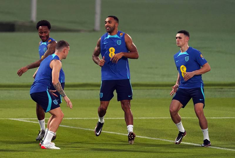 England's Callum Wilson and Phil Foden during training. PA