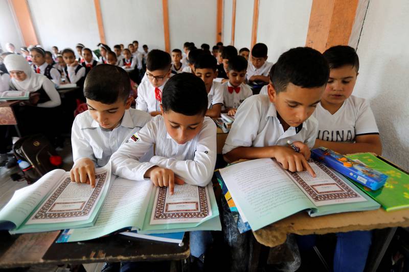 Students are seen in class on the first day of the new school term at a primary school in Baghdad, Iraq October 1, 2019. REUTERS/Khalid al-Mousily