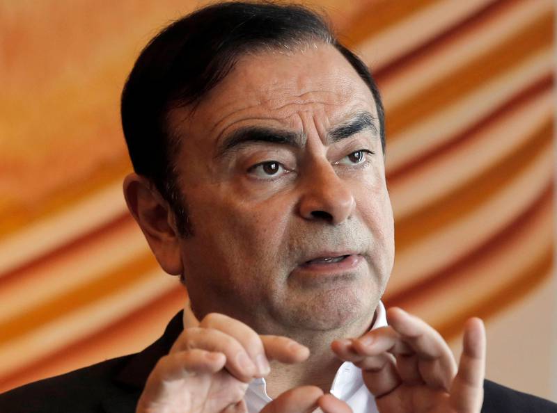 FILE - In this April 20, 2018, file photo, then Nissan Chairman Carlos Ghosn speaks during an interview in Hong Kong. Major Japanese business daily Nikkei is reporting Nissanâ€™s former Chairman Carlos Ghosn has reiterated his innocence, saying the payments to a Saudi businessman were legitimate. (AP Photo/Kin Cheung, File)