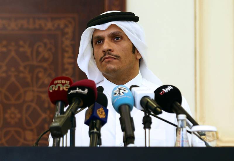 Qatari Foreign Minister Sheikh Mohammed bin Abdulrahman Al-Thani listens as his Italian counterpart speaks during a press conference in Doha on August 2, 2017.
Qatar announced a five-billion-euro order for seven warships from Italy in the midst of a nearly two-month diplomatic crisis with neighbouring Saudi Arabia and its allies. / AFP PHOTO / STRINGER