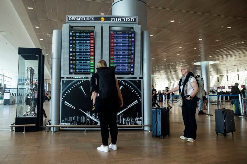 Eine Abflugtafel am Flughafen Ben Gurion zeigt Annullierungen von Flügen, die Israel verlassen.  Getty 