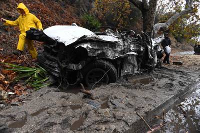 Mud fills a street after a rain-driven mudslide destroyed two cars and damaged property in a neighborhood under mandatory evacuation in Burbank, California, January 9, 2018.
Mudslides unleashed by a ferocious storm demolished homes in southern California, authorities said Tuesday. Five people were reported killed. / AFP PHOTO / Robyn Beck