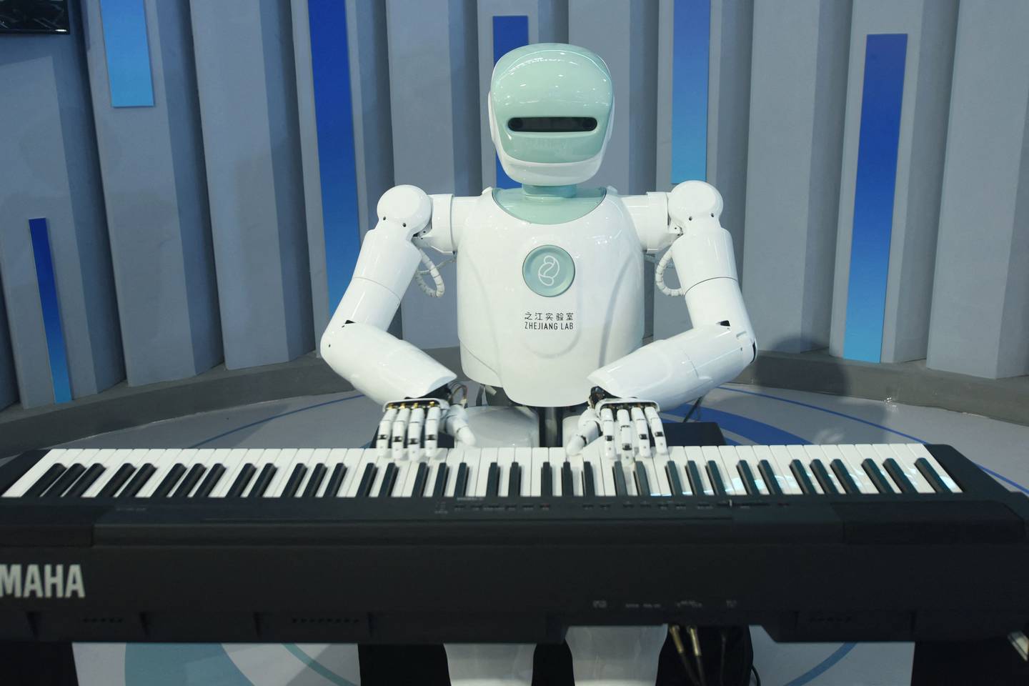 A robot plays the piano at the Apsara Conference, a cloud computing and artificial intelligence conference in Hangzhou, China. Photo: STR / AFP