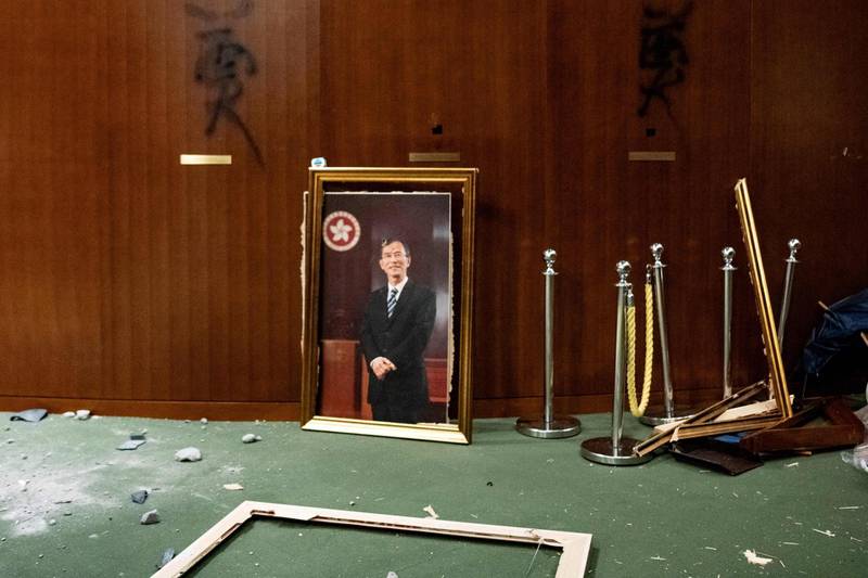 The portrait of former chairman of the Legislative Council Jasper Tsang is destroyed. AFP
