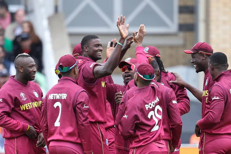 West Indies' captain Jason Holder celebrates with teammates taking the wicket of Pakistan's captain Sarfaraz Ahmed. AP Photo