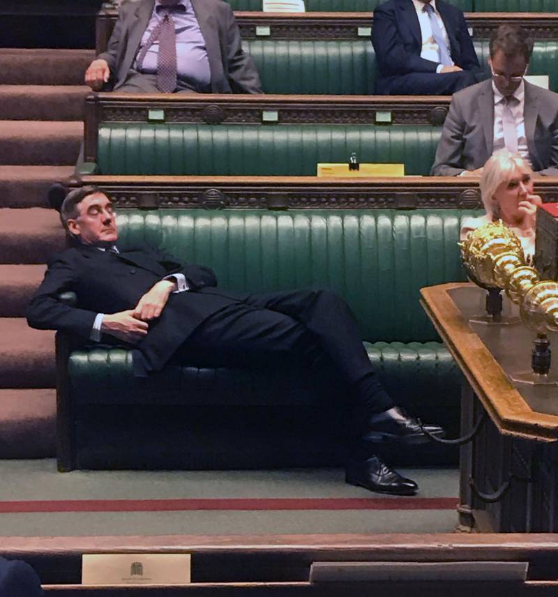 TOPSHOT - This handout picture released on the Twitter page of British Labour party MP for Redcar, Anna Turley, shows shows Britain's Leader of the House of Commons Jacob Rees-Mogg relaxing on the front benches during the Standing Order 24 emergency debate on a no-deal Brexit in the House of Commons in London on September 3, 2019. British Prime Minister Boris Johnson braced for another showdown in parliament on Wednesday after a humiliating defeat over his Brexit strategy, with MPs set to vote on a law aimed at blocking a no-deal departure. Johnson has said he will seek an early general election if MPs vote against him again, intensifying a dramatic political crisis ahead of his October 31 Brexit deadline. - RESTRICTED TO EDITORIAL USE - MANDATORY CREDIT "AFP PHOTO / Anna Turley MP via Twitter" - NO MARKETING NO ADVERTISING CAMPAIGNS - DISTRIBUTED AS A SERVICE TO CLIENTS == NO ARCHIVES

 / AFP / Anna Turley / HO / RESTRICTED TO EDITORIAL USE - MANDATORY CREDIT "AFP PHOTO / Anna Turley MP via Twitter" - NO MARKETING NO ADVERTISING CAMPAIGNS - DISTRIBUTED AS A SERVICE TO CLIENTS == NO ARCHIVES

