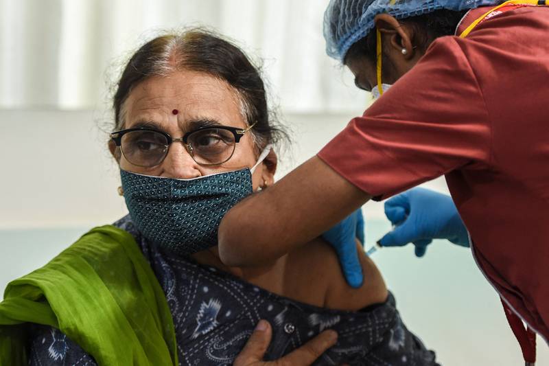 A woman gets inoculated with a dose of Russia's Sputnik V Covid-19 vaccine in Mumbai.