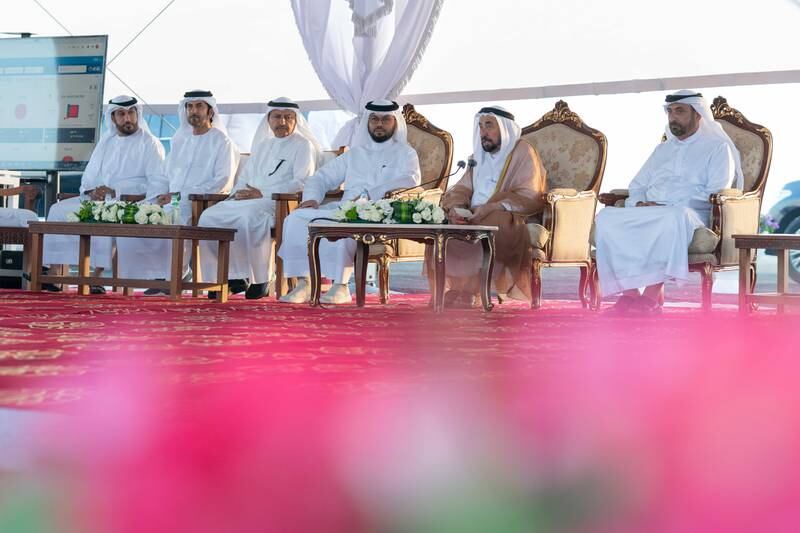 Sheikh Dr Sultan Al Qasimi, Ruler of Sharjah, sits with several officials at the inauguration of the wheat farm
