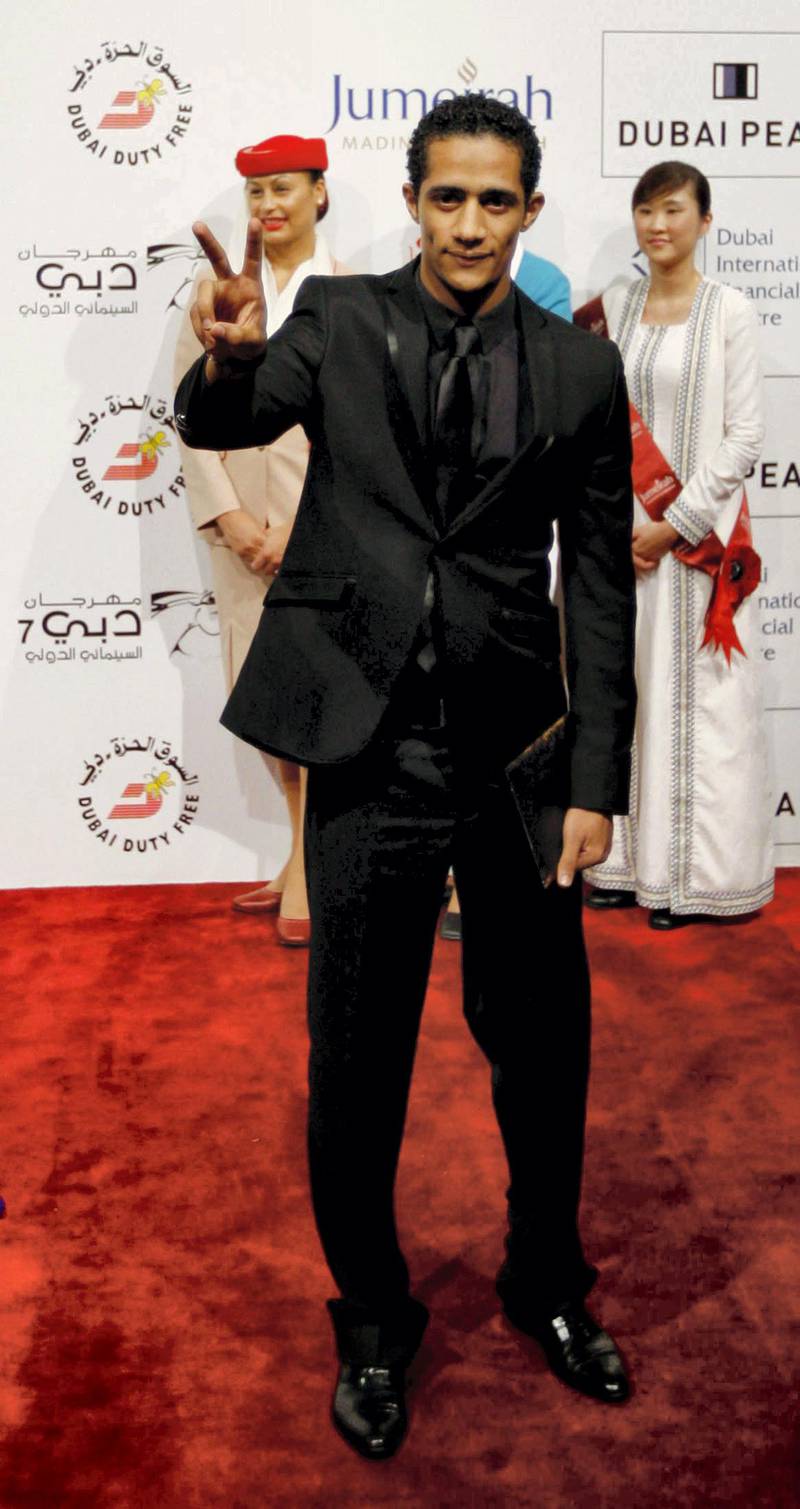 Actor Mohamed Ramadan of "Cairo Exit" poses during the red carpet closing ceremony of the 7th Dubai International Film Festival December 19, 2010. REUTERS/Jumana El Heloueh (UNITED ARAB EMIRATES - Tags: ENTERTAINMENT)