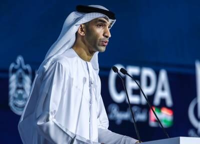 Dr Thani Al Zeyoudi, Minister of State for Foreign Trade, speaks at the Annual Investment Meeting in Abu Dhabi on Monday. Victor Besa / The National